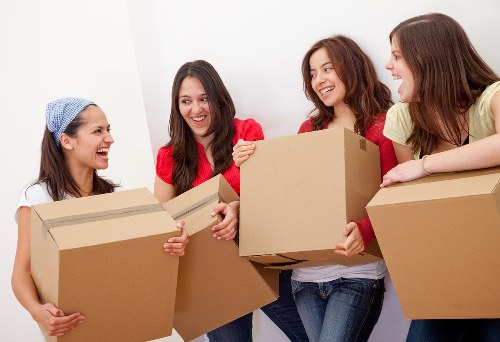 Loading furniture and boxes into a moving van in Uxbridge