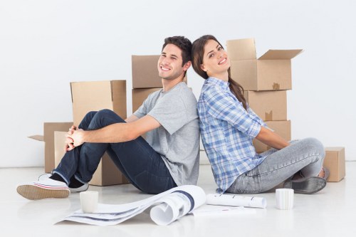 Trained movers using protective gear during a relocation job