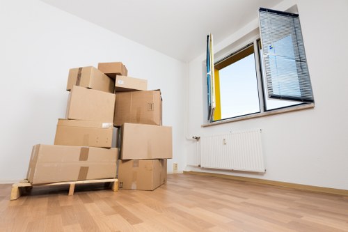 Boxes and wrapped furniture ready for a house move