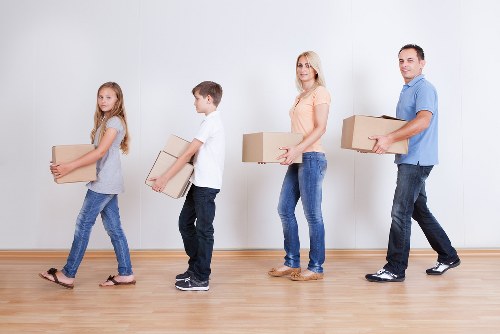 Packed office boxes and furniture ready for transport in Uxbridge