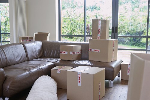 Professional movers handling furniture in a Uxbridge house relocation