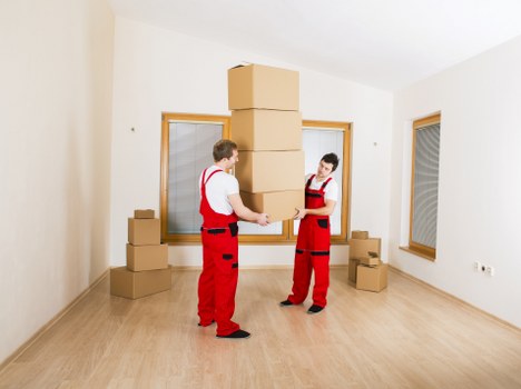 Packed boxes and furniture ready for local removals